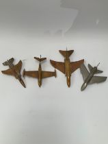 Four various models of 1950's and later stylised jet fighter aircraft including Jaguar