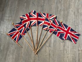 A collection of Union Flags on poles