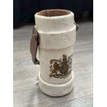 A George Crown cork shell carrier with brown leather handle, decal intact, painted in white