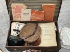 A suitcase and a box of mixed ephemera including aircraft recognition booklet, Pilot's Flight
