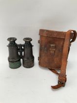 A pair of WWI era French Lemaire of Paris binoculars, the T. French & Son Ltd of London case stamped