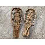 A pair of WWII snowshoes, dated 1941, some worm and damage