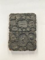 A 19th Century Gutta Percha card case of rectangular form, impressed with various seals including
