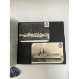 Three Navy News photograph albums
