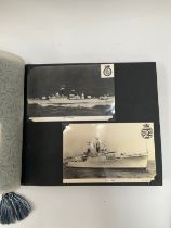 Three Navy News photograph albums