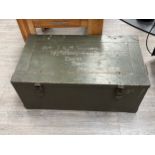 A WWII German trunk / ammunition box, green painted, the inner lid with Nazi labels, painted with