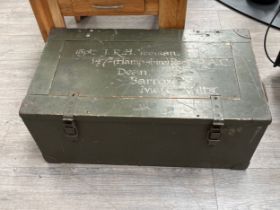 A WWII German trunk / ammunition box, green painted, the inner lid with Nazi labels, painted with