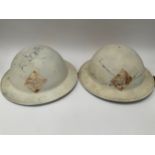 Two WWII 1942 dated British Army helmets with liners, repainted