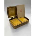A WWI Christmas 1914 Princess Mary gift tin with gift card, tobacco and cigarette packets, the tin