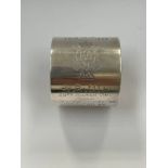 A heavy silver napkin ring with The Queens Own Cameron Highlanders Serviceman J.D. McL, Edinburgh