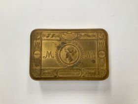 A WWI Christmas 1914 Princess Mary gift tin with contents consisting of bullet pencil and card