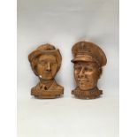 Two Senior Service gilded plaster heads