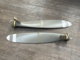 A matched pair of propeller blades, aircraft type and age unknown