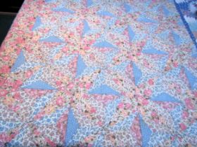 A 1970's hand quilted patchwork quilt "Nimbus Label"