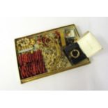 A box containing vintage costume jewellery