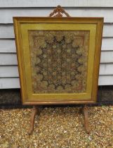 A 19th Century gilt and gesso fire screen with egg and dart and Greek key borders. Set with a highly