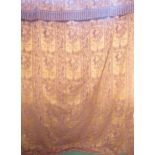 A pair of bronze and plum heavy curtains bearing a heraldic design with a motto Pro Imperator et