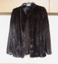 A mink jacket in dark brown
