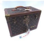 LOUIS VUITTON: Boîte à flacons vanity case in brown monogram canvas and natural leather. 'LV'