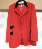 A vintage scarlet huntsman's jacket with black velvet trim on pockets an collar, Pytchley by Phillip