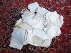 Two bags containing vintage table linens