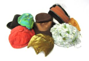 A selection of mid century ladies fashion headwear, some for restoration