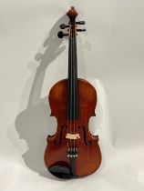 A late 19th/early 20th Century Stradivarius copy violin, restored, full sixed (4/4) two-piece figur