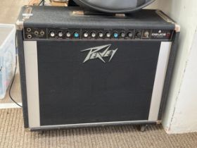 A Peavey Model 212 Deuce VT Series amplifier with cover COLLECTOR'S ELECTRICAL ITEM: Item requires