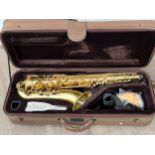 A Jericho tenor saxophone, brass, cased with accessories