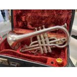 A Boosey & Hawkes silver plated cornet, serial no 148505, cased with mouthpieces