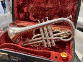 A Boosey & Hawkes silver plated cornet, serial no 148505, cased with mouthpieces