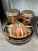 A quantity of percussion items including bodhran and beaters etc.