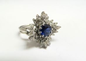 A white gold sapphire and diamond cluster ring, unmarked. Size K, 7.2g