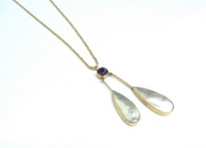 A 9ct gold woven chain pendant necklace 50cm long hung with two pear shaped blister pearls suspended