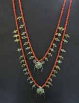 An 18th Century Eastern neckpiece, the two strands of coral beads interspersed with thin gold