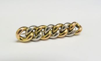 A two tone "frozen chain" bar brooch, unmarked 7.2g