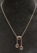 A circa 1910 amethyst drop necklace, chain stamped 9c, 40cm long, 9.5g