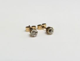 A pair of diamond stud earrings, 0.20ct each approx