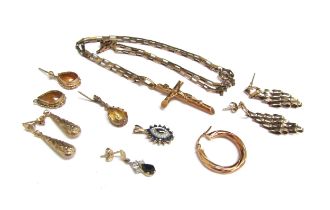A quantity of gold items including 9ct gold crucifix on chain, earrings, pendants etc, 15.4g total