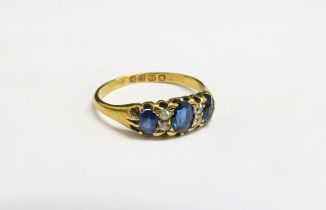 An 18ct gold late 19th Century sapphire and diamond ring, Chester hallmarks. Size P, 2.7g