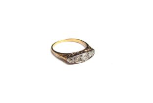 A five stone diamond ring, in unmarked gold shank. Size N/O, 3.1g