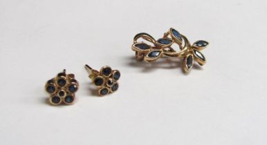 A pair of 9ct gold sapphire daisy stud earrings and a similar small brooch, 2.4g