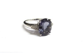 A 9ct gold diamond and blueberry quartz ring. Size J/K, 3.4g