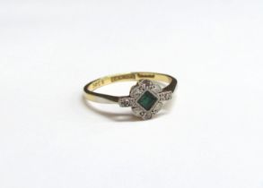 An emerald and diamond ring, 18ct/plat. Size M, 2g