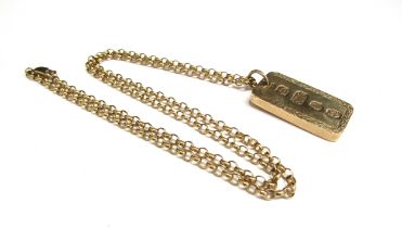 A 9ct gold belcher chain necklace, 60cm long hung with a 9ct gold ingot pendant, 42.7g