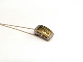 A 9ct gold yellow sapphire and diamond pendant, hung on chain stamped 375, 46cm long, 3.2g
