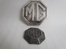 Two MG badges