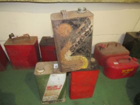 Three oil cans including Shell Superior