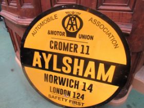A circular tin sign made up with stickers to look like an Automobile Association sign, 74cm diameter