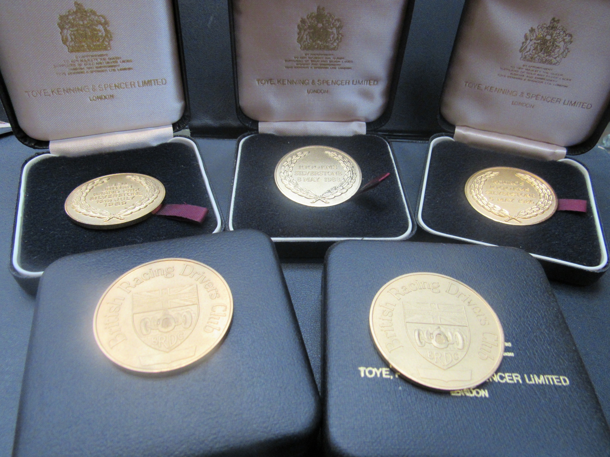Five British Racing Drivers club medallions in cases. 1985, 86, 87, 88, and 1989